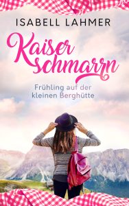Link zum E-Book von Isabell Lahmers "Kaiserschmarrn - Frühling auf der kleinen Berghütte". 
Coverbeschreibung: Eine junge Frau mit Hut blickt auf ein Bergpanorama, oben und unten sieht man eine pink-weiße Tischdecke.